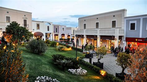 sicilia outlet village prezzi.